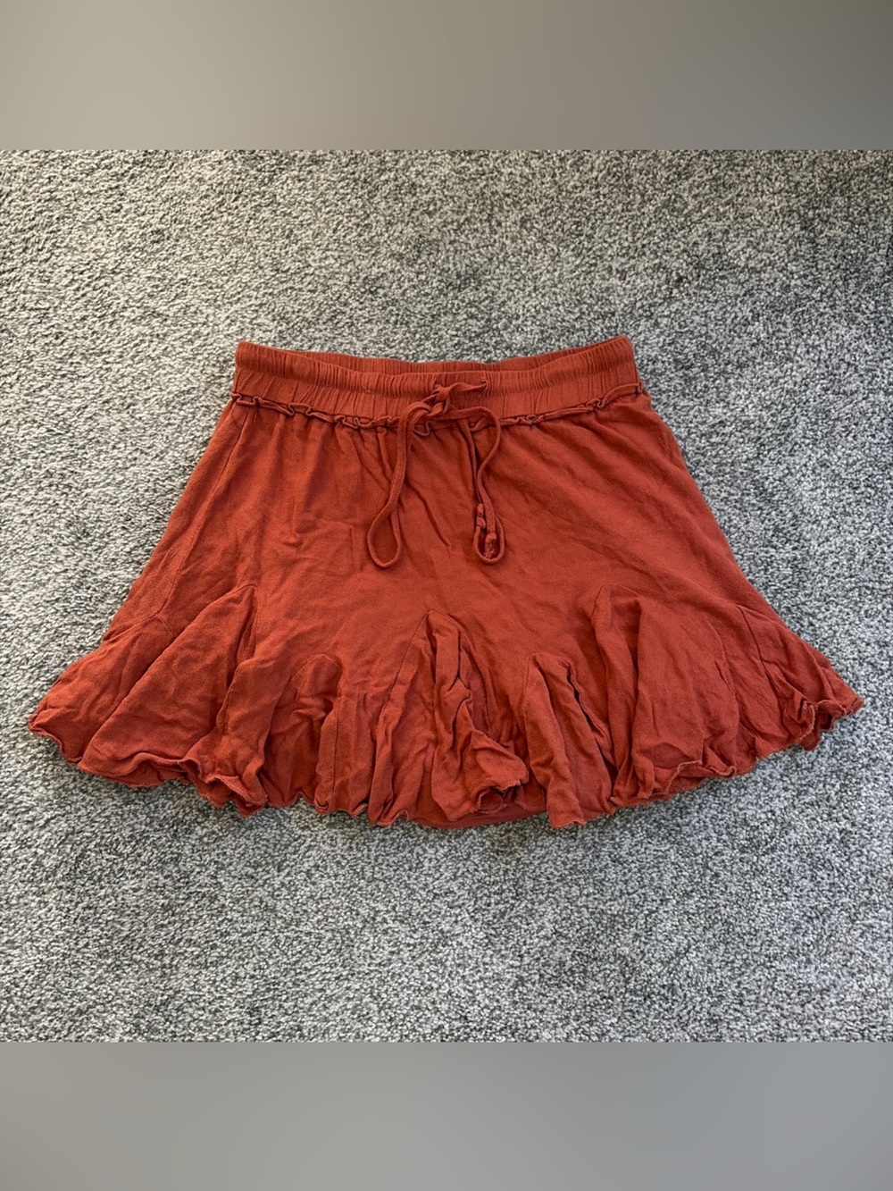 Burnt orange mini flowy skirt